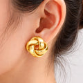boucles d'oreilles torsadées acier inoxydable doré femme élégantes